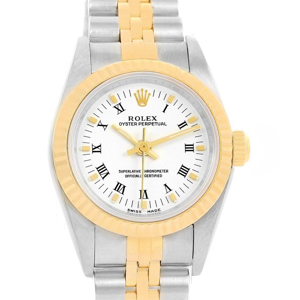 The image shows a frontal view of a Rolex Oyster Perpetual 76193 Women's Steel and Gold (two tone) White Dial 76193 Women's Steel and Gold (two tone) White Dial watch with a two-tone metal band and yellow gold bezel.