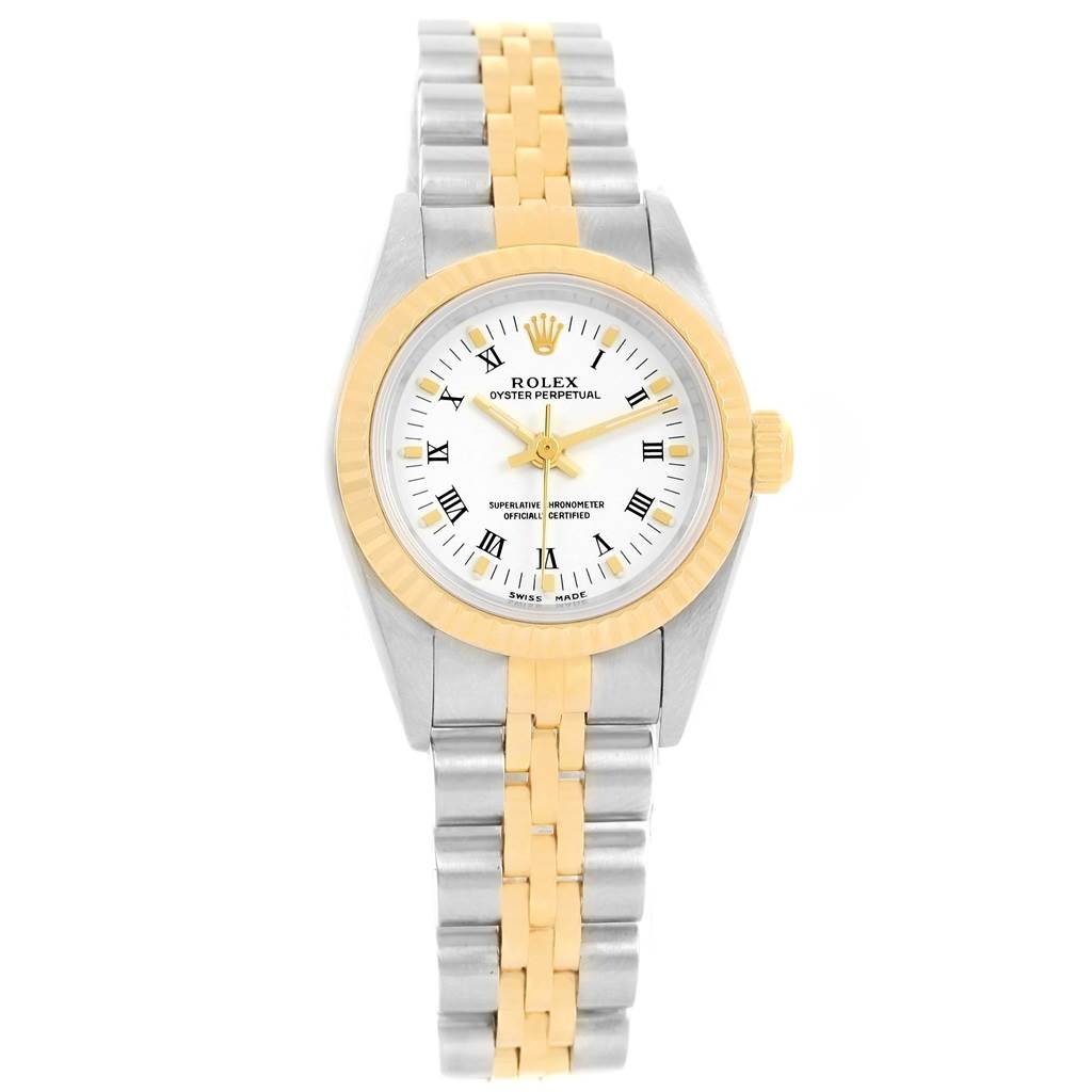 This image shows a Rolex Oyster Perpetual 76193 Women's Steel and Gold (two tone) White Dial 76193 Women's Steel and Gold (two tone) White Dial watch from a top-down angle, highlighting the face and the two-tone bracelet.
