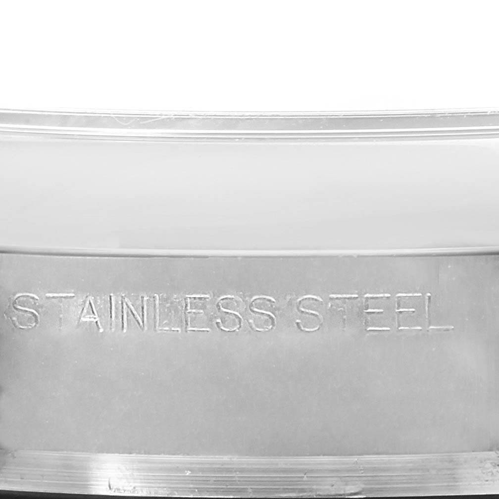 This image shows a close-up view of the stainless steel casing of a Rolex Oyster Perpetual 176200 Women's Stainless Steel White Dial 176200 Women's Stainless Steel White Dial watch.