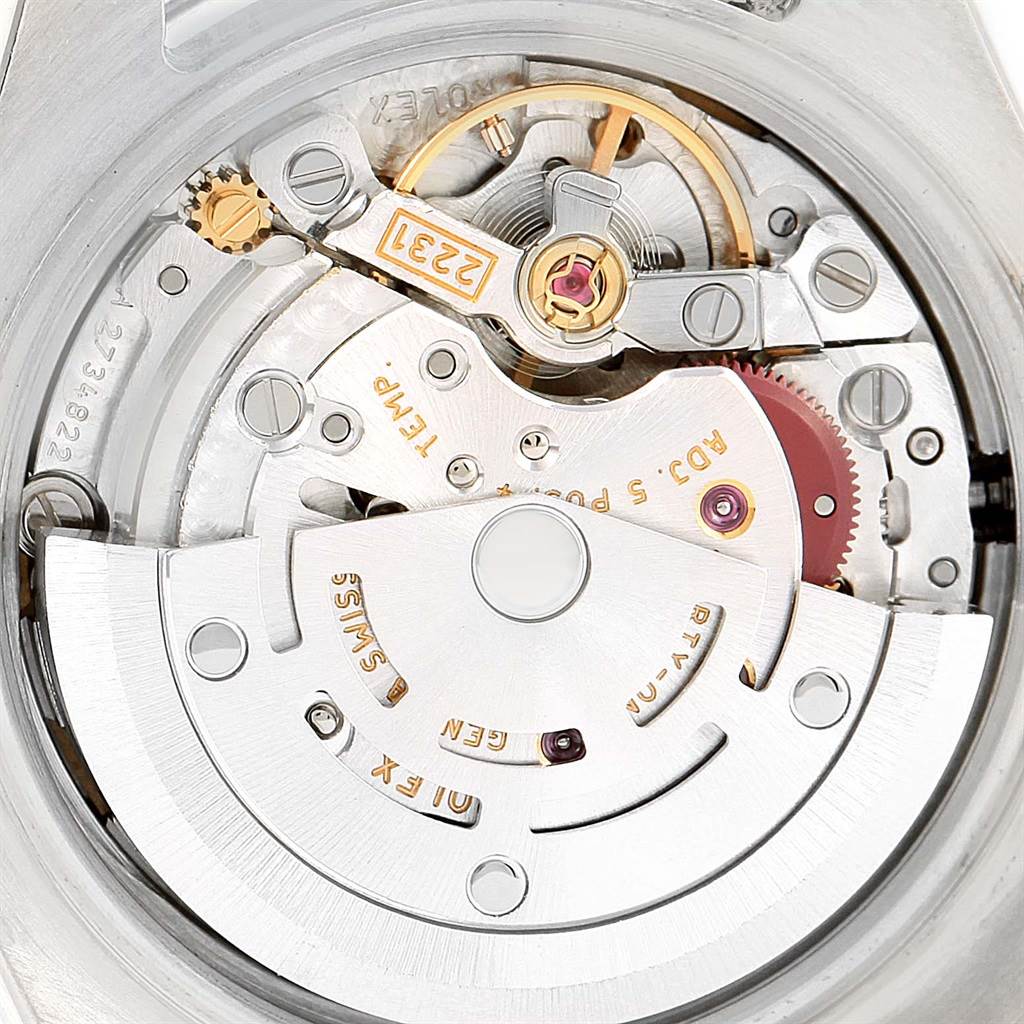 This image shows a close-up of the movement mechanism of a Rolex Oyster Perpetual 176200 Women's Stainless Steel White Dial 176200 Women's Stainless Steel White Dial watch, displaying intricate components.