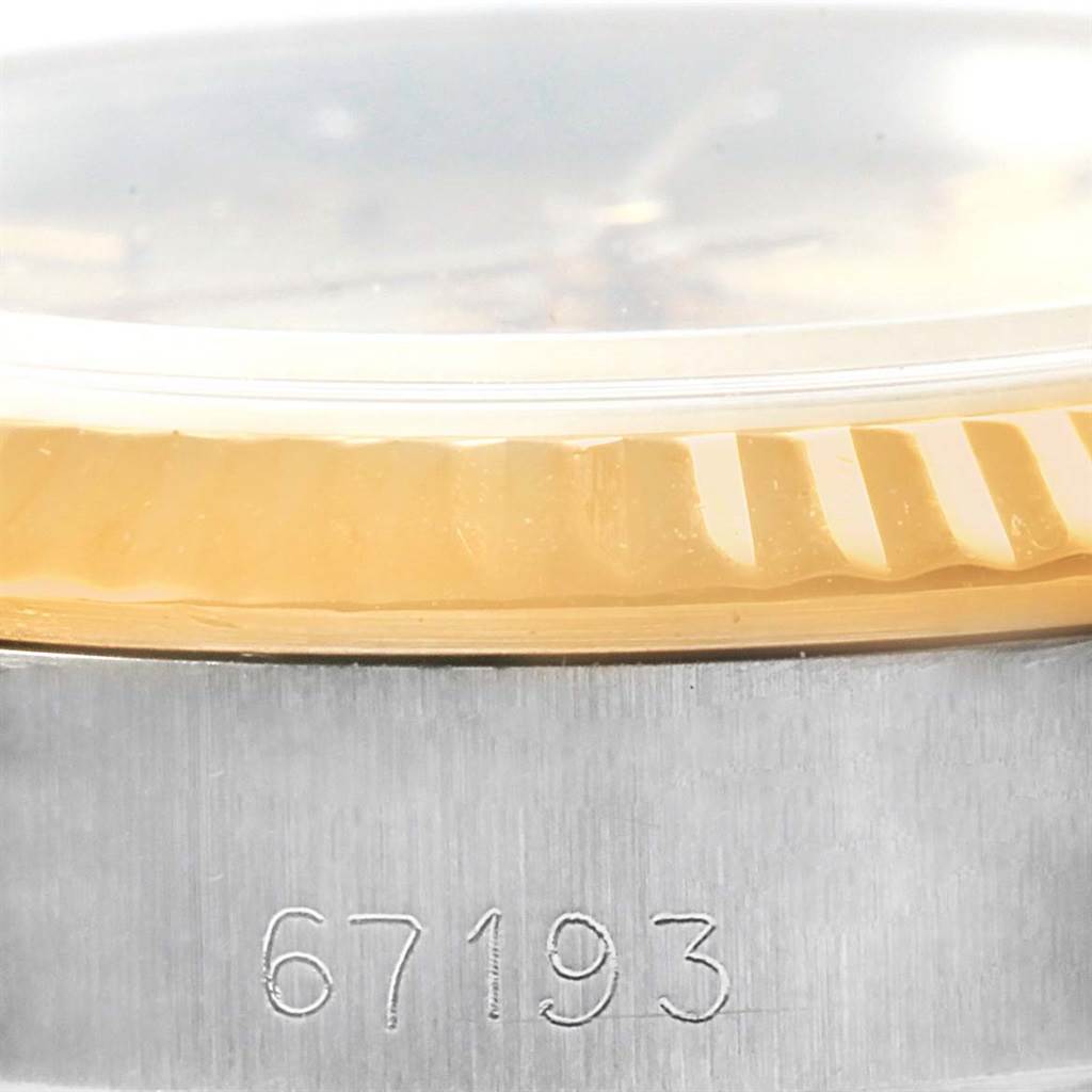 The image shows a close-up view of the case and bezel of a Rolex Oyster Perpetual 67193 Women's Steel and Gold (two tone) Champagne Dial 67193 Women's Steel and Gold (two tone) Champagne Dial watch, including the model number 67193.