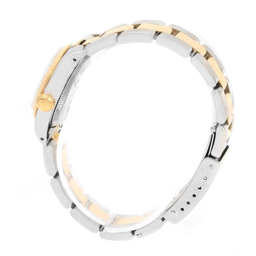 The image shows a side profile of a Rolex Oyster Perpetual 67193 Women's Steel and Gold (two tone) Champagne Dial 67193 Women's Steel and Gold (two tone) Champagne Dial watch, focusing on the bracelet and crown.