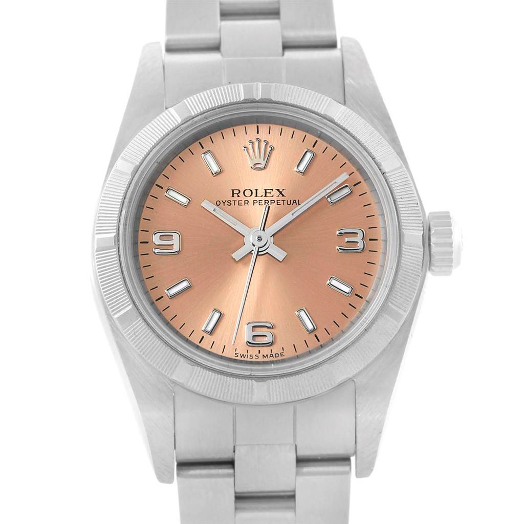The image shows a front view of a Rolex Oyster Perpetual 76030 Women
s Stainless Steel Pink Dial 76030 Women
s Stainless Steel Pink Dial watch, highlighting its pink dial, bezel, and bracelet.
