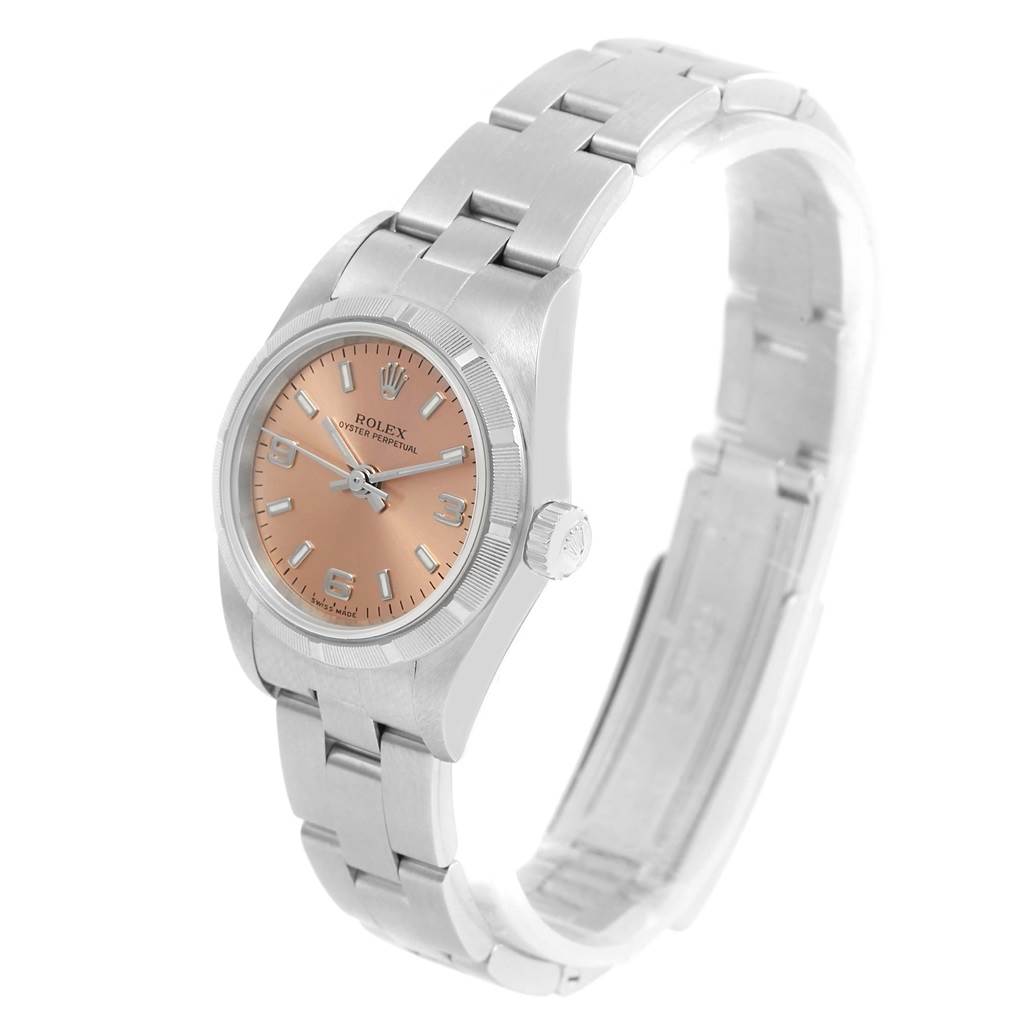 The image shows a Rolex Oyster Perpetual 76030 Women
s Stainless Steel Pink Dial 76030 Women
s Stainless Steel Pink Dial watch at a three-quarter angle, displaying its face, bracelet, and crown.