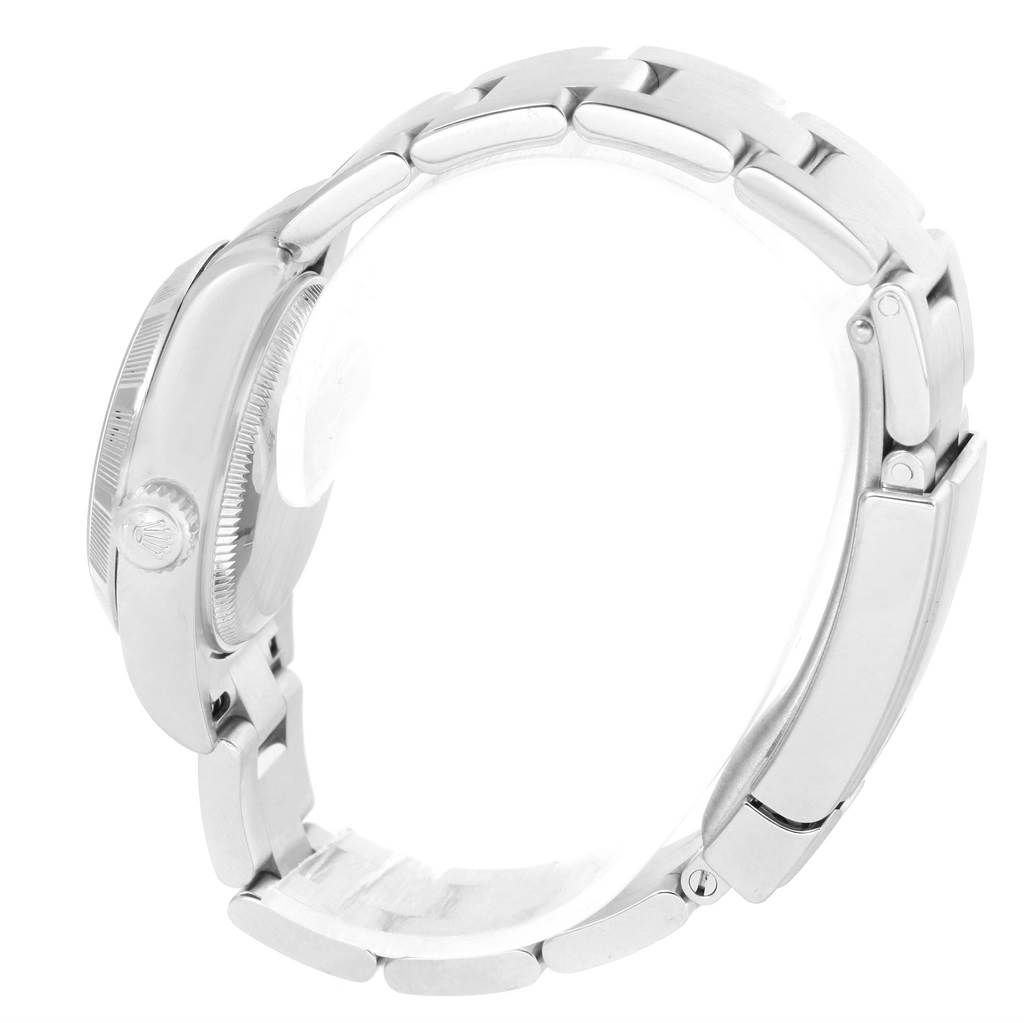 The image shows a side view of a Rolex Oyster Perpetual 176210 Women's Stainless Steel Pink Dial 176210 Women's Stainless Steel Pink Dial watch, highlighting the crown and bracelet.