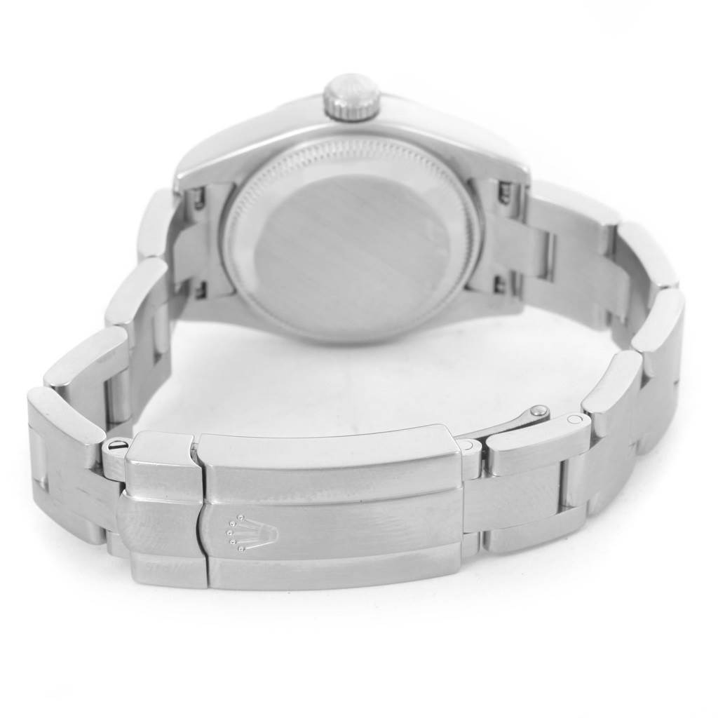 The image shows the back of a Rolex Oyster Perpetual 176210 Women's Stainless Steel Pink Dial 176210 Women's Stainless Steel Pink Dial watch and its bracelet clasp from a rear angle.