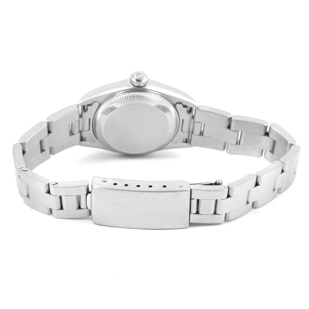 This image shows the back view of a Rolex Oyster Perpetual 76080 Women's Stainless Steel Black Dial 76080 Women's Stainless Steel Black Dial watch, highlighting the case back, crown, and bracelet clasp.