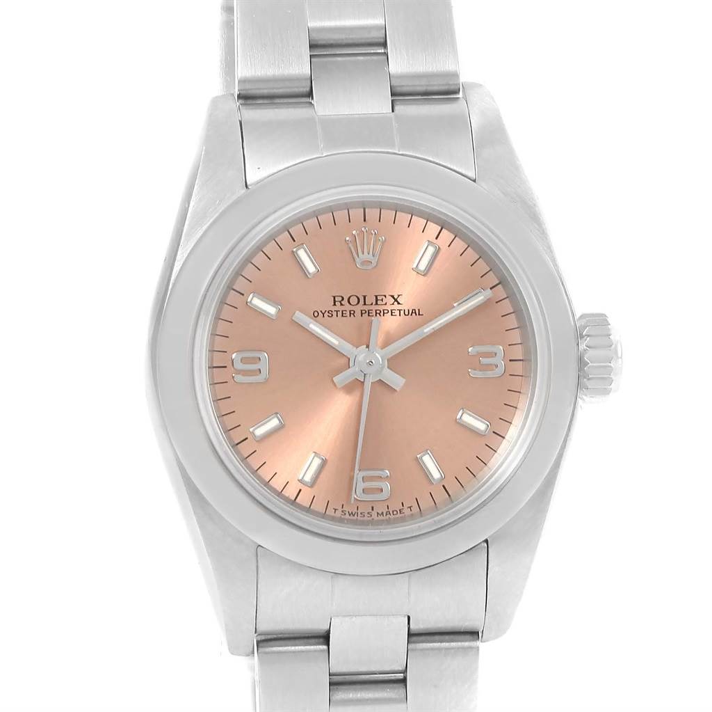 This image shows a front view of a Rolex Oyster Perpetual 67180 Women
s Stainless Steel Pink Dial 67180 Women
s Stainless Steel Pink Dial watch, displaying its pink dial, crown, and stainless steel bracelet.