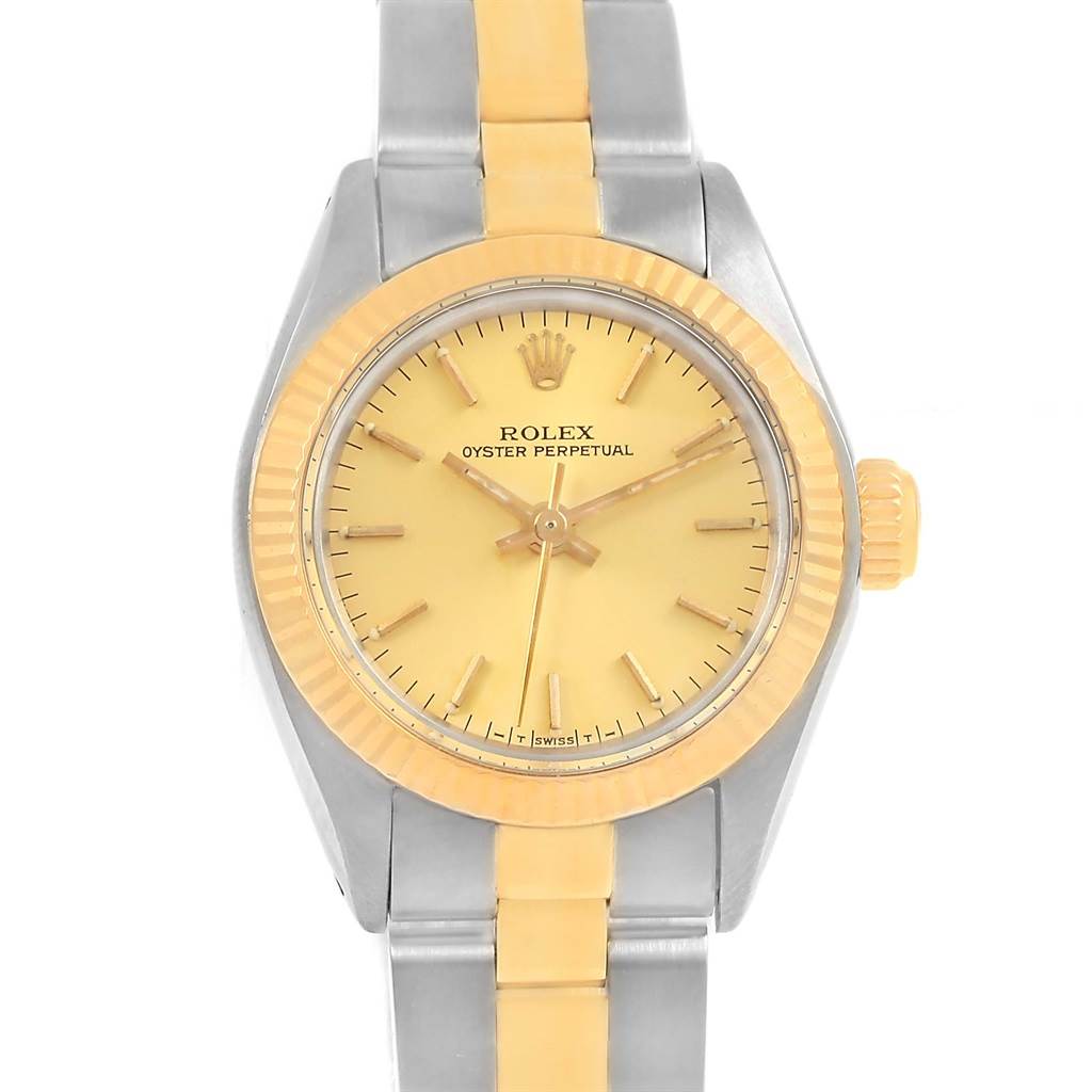 The image shows a Rolex Oyster Perpetual 6719 Women's Steel and Gold (two tone) Champagne Dial 6719 Women's Steel and Gold (two tone) Champagne Dial watch from a front angle, highlighting its dial, bezel, crown, and partially the bracelet.