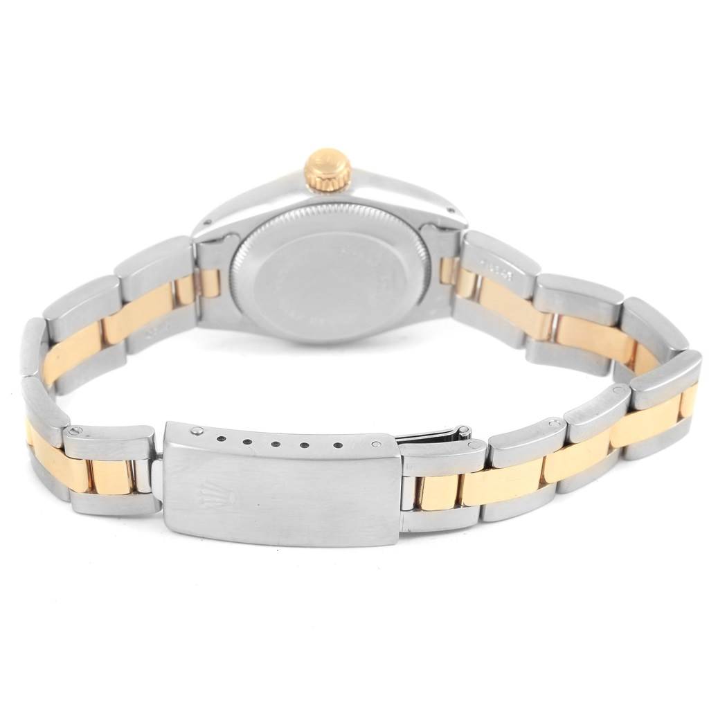 The image shows the back view of a Rolex Oyster Perpetual 6719 Women's Steel and Gold (two tone) Champagne Dial 6719 Women's Steel and Gold (two tone) Champagne Dial watch, focusing on its clasp and bracelet.