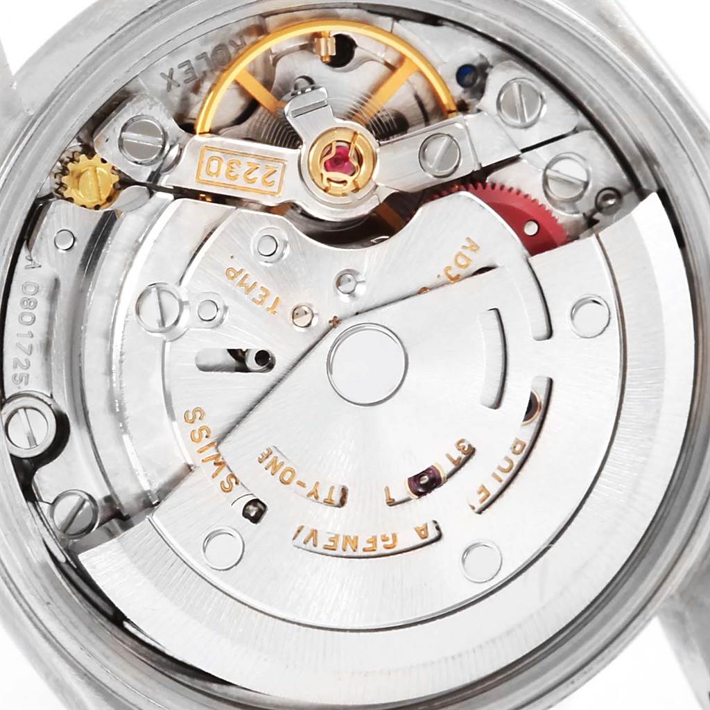 This image shows the movement mechanism of a Rolex Oyster Perpetual 76080 Women
s Stainless Steel Black Dial 76080 Women
s Stainless Steel Black Dial watch from a top-down angle.