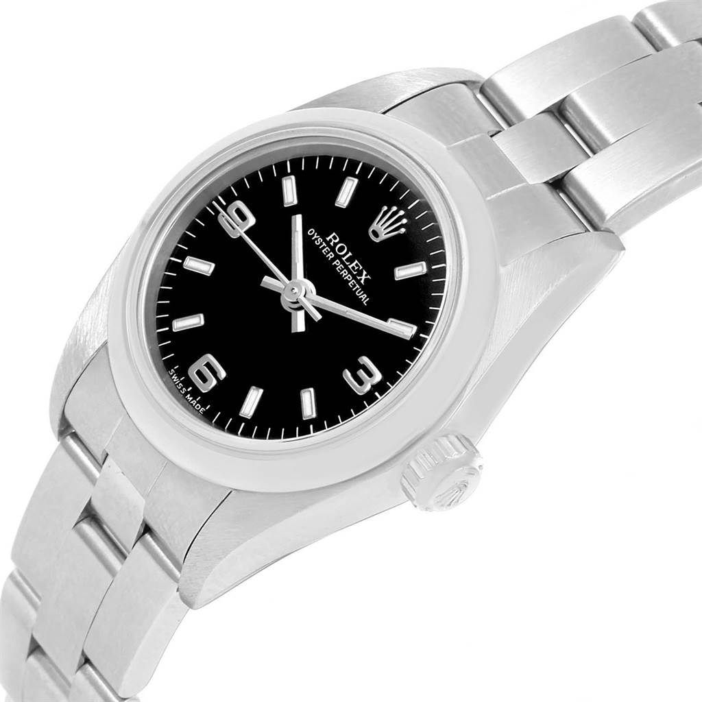 The Rolex Oyster Perpetual 76080 Women
s Stainless Steel Black Dial 76080 Women
s Stainless Steel Black Dial watch is shown from a top angle, highlighting its black dial, silver bezel, and bracelet.