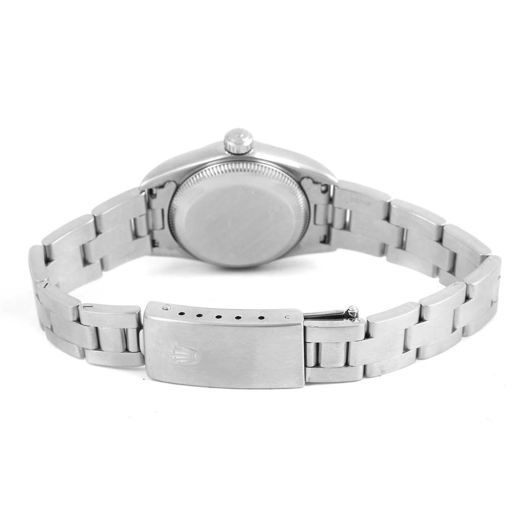 The image shows the back and bracelet of a Rolex Oyster Perpetual 76080 Women
s Stainless Steel Blue Dial 76080 Women
s Stainless Steel Blue Dial watch, viewed from an angled rear perspective.