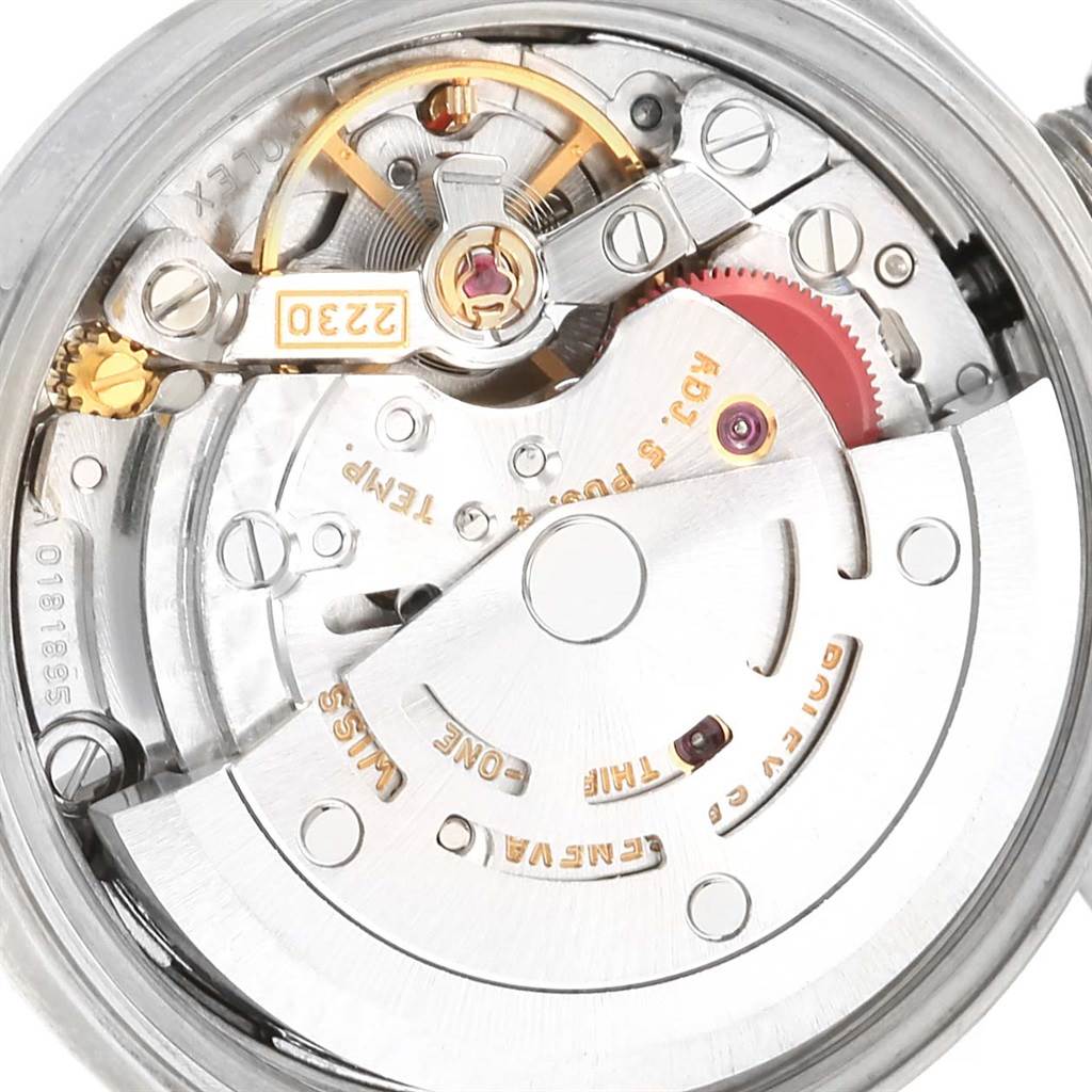 This image shows a close-up view of the internal mechanism of a Rolex Oyster Perpetual 76080 Women
s Stainless Steel Blue Dial 76080 Women
s Stainless Steel Blue Dial watch.