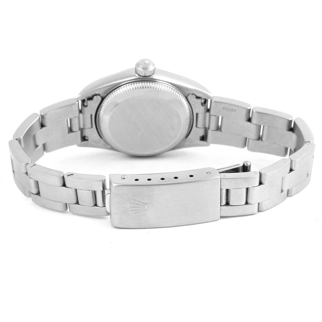 The image shows the back and bracelet of a Rolex Oyster Perpetual 76080 Women
s Stainless Steel White Dial 76080 Women
s Stainless Steel White Dial watch.
