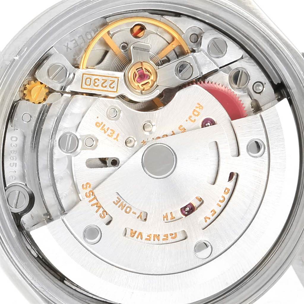 The image shows the inner mechanical movement and parts of a Rolex Oyster Perpetual 76080 Women
s Stainless Steel White Dial 76080 Women
s Stainless Steel White Dial watch.