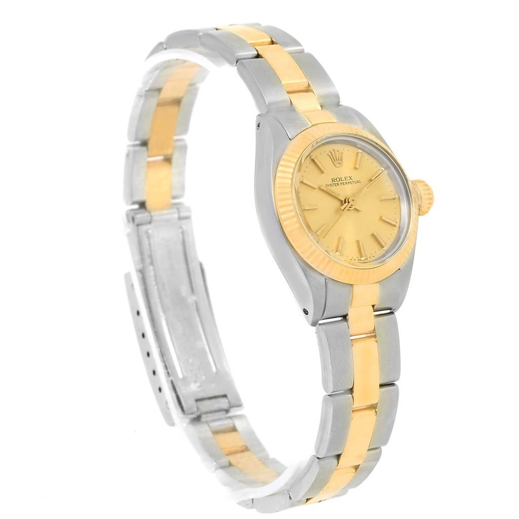 The image shows a Rolex Oyster Perpetual 6719 Women's Steel and Gold (two tone) Champagne Dial 6719 Women's Steel and Gold (two tone) Champagne Dial watch at a three-quarter angle, highlighting its two-tone gold and silver bracelet and dial.