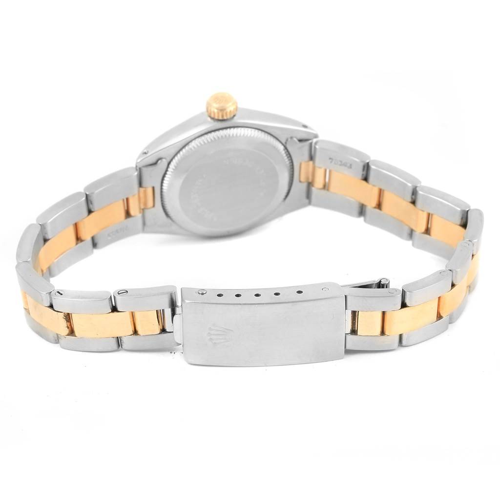 This image shows the back of a Rolex Oyster Perpetual 6719 Women's Steel and Gold (two tone) Champagne Dial 6719 Women's Steel and Gold (two tone) Champagne Dial watch, highlighting the case back, bracelet, and clasp.