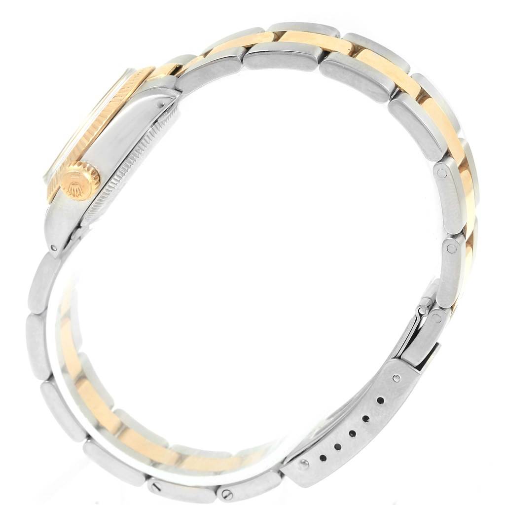 The image shows a side view of the Rolex Oyster Perpetual 6719 Women's Steel and Gold (two tone) Champagne Dial 6719 Women's Steel and Gold (two tone) Champagne Dial watch, focusing on the bracelet and the crown.