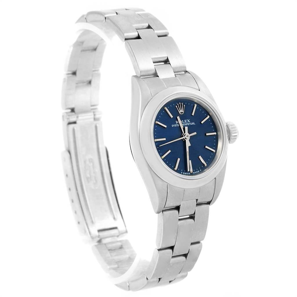 The image shows a side view of a Rolex Oyster Perpetual 67180 Women
s Stainless Steel Blue Dial 67180 Women
s Stainless Steel Blue Dial watch, highlighting the bracelet, case, and dial.