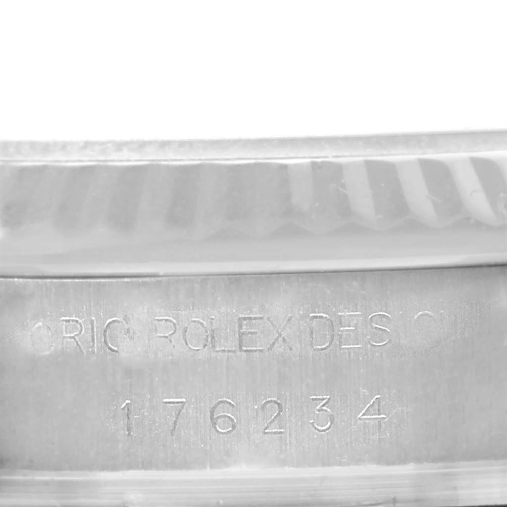 This image shows the engraved serial number on the case side of a Rolex Oyster Perpetual 176234 Women
s Stainless Steel Pink Dial 176234 Women
s Stainless Steel Pink Dial watch.