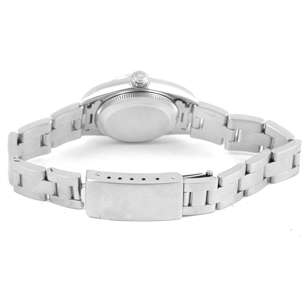 This image shows the backside and bracelet clasp of a Rolex Oyster Perpetual 76080 Women
s Stainless Steel Black Dial 76080 Women
s Stainless Steel Black Dial watch.