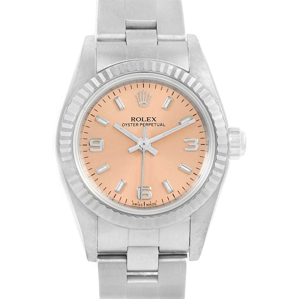 This image shows a frontal view of a Rolex Oyster Perpetual 76094 Women
s Stainless Steel Pink Dial 76094 Women
s Stainless Steel Pink Dial watch, highlighting its dial, bezel, and part of the bracelet.