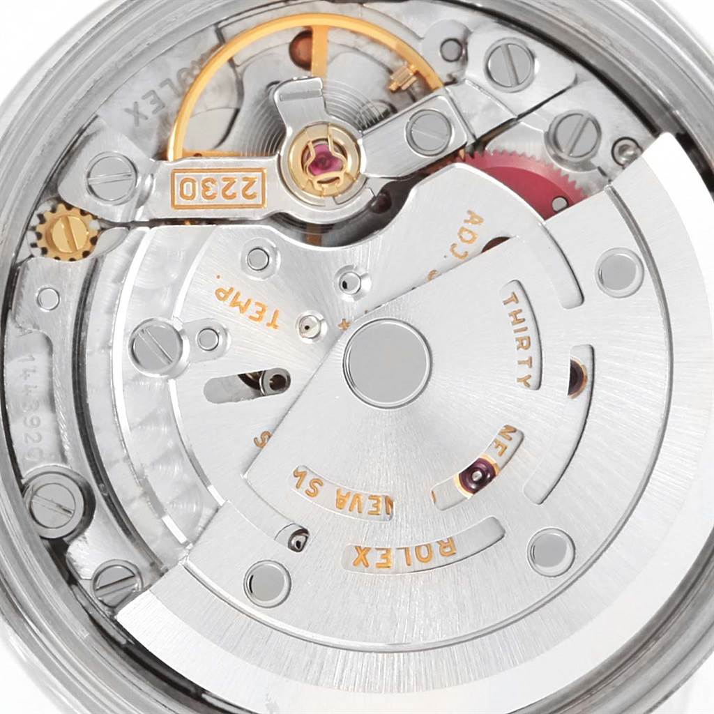 The image shows the internal movement mechanism of a Rolex Oyster Perpetual 76094 Women
s Stainless Steel Pink Dial 76094 Women
s Stainless Steel Pink Dial watch viewed from the back.