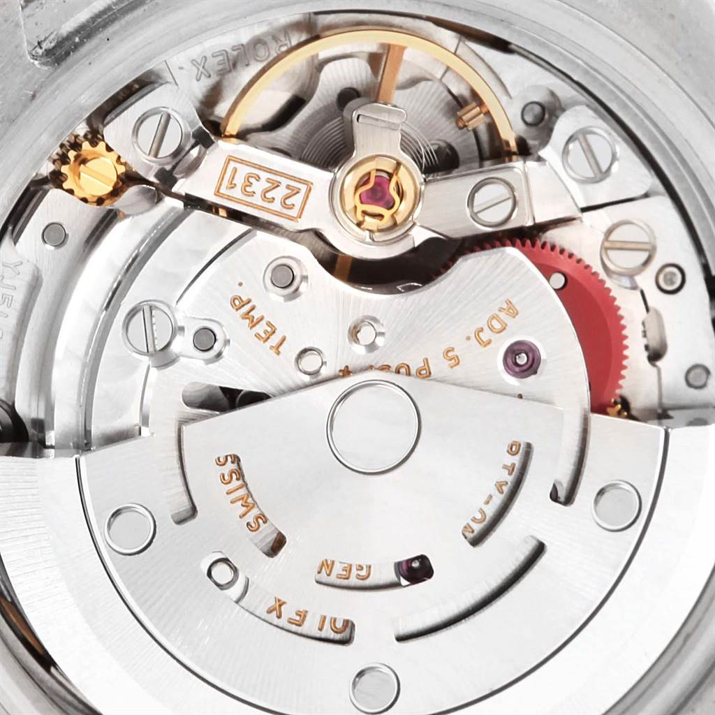 This close-up image shows the intricate movement and mechanical parts of the Rolex Oyster Perpetual 176200 Women's Stainless Steel Black Dial 176200 Women's Stainless Steel Black Dial watch.
