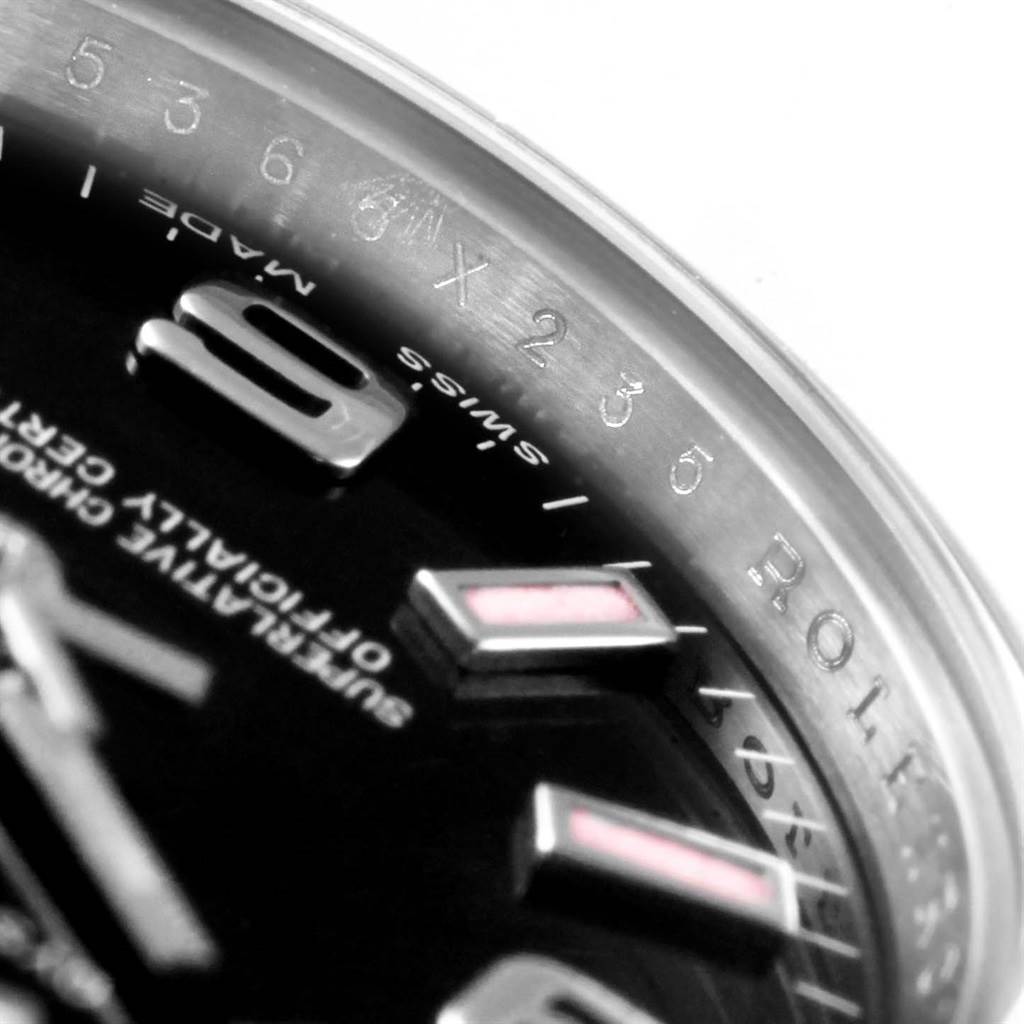 The image shows a close-up angle of the dial and the inner bezel of a Rolex Oyster Perpetual 176200 Women's Stainless Steel Black Dial 176200 Women's Stainless Steel Black Dial watch, highlighting the “ROLEX” inscription and hour markers.