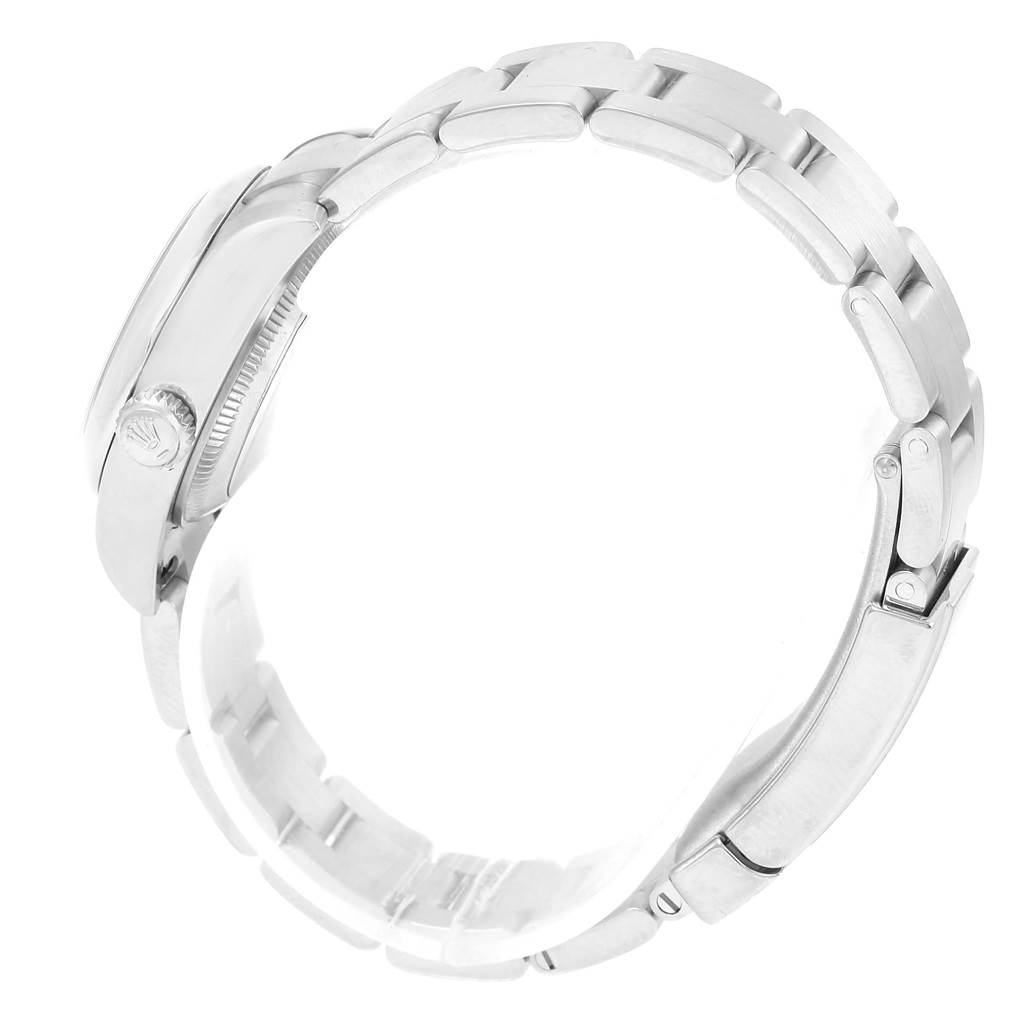 The image shows a side view of a Rolex Oyster Perpetual 176200 Women's Stainless Steel Black Dial 176200 Women's Stainless Steel Black Dial watch, highlighting its crown and bracelet links.