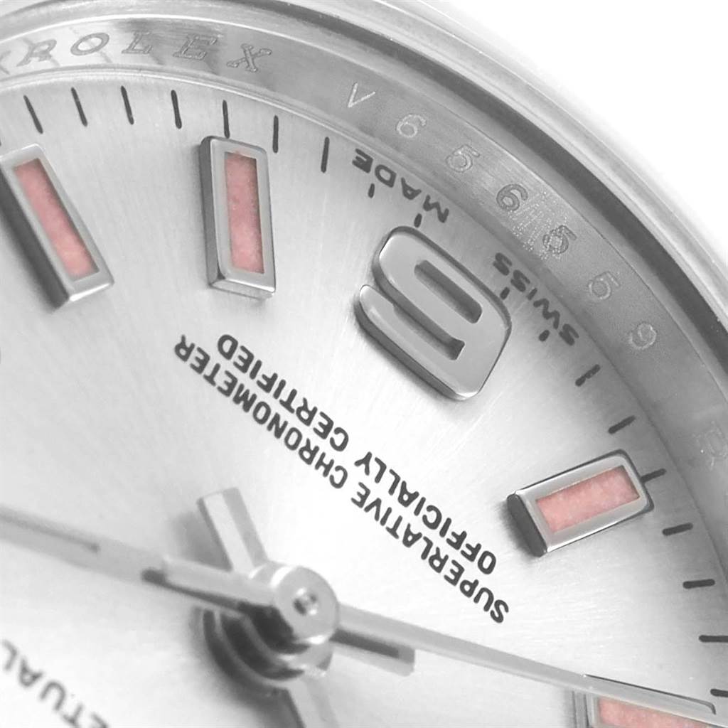 Close-up of the dial, markers, and hands of the Rolex Oyster Perpetual 176200 Women
s Stainless Steel Silver Dial 176200 Women
s Stainless Steel Silver Dial watch, showing part of the hour markers and text.