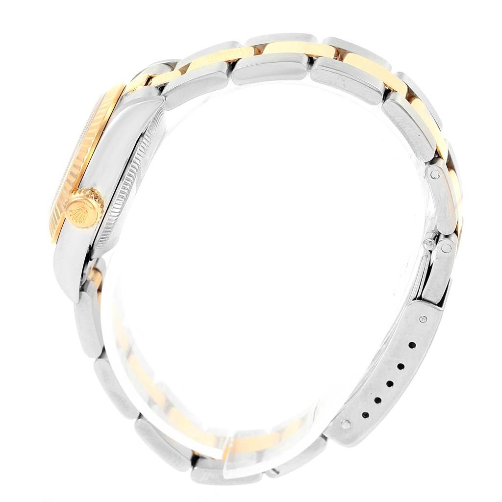 The image shows a side view of a Rolex Oyster Perpetual 67193 Women's Steel and Gold (two tone) Black Dial 67193 Women's Steel and Gold (two tone) Black Dial watch, focusing on the crown, bezel, and bracelet.