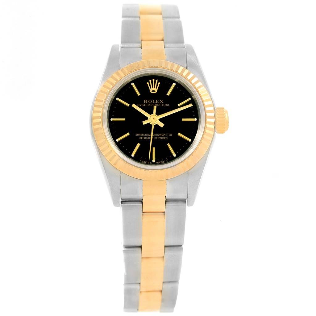 The Rolex Oyster Perpetual 67193 Women's Steel and Gold (two tone) Black Dial 67193 Women's Steel and Gold (two tone) Black Dial watch is shown from a front angle, displaying its face, bezel, crown, and bracelet.