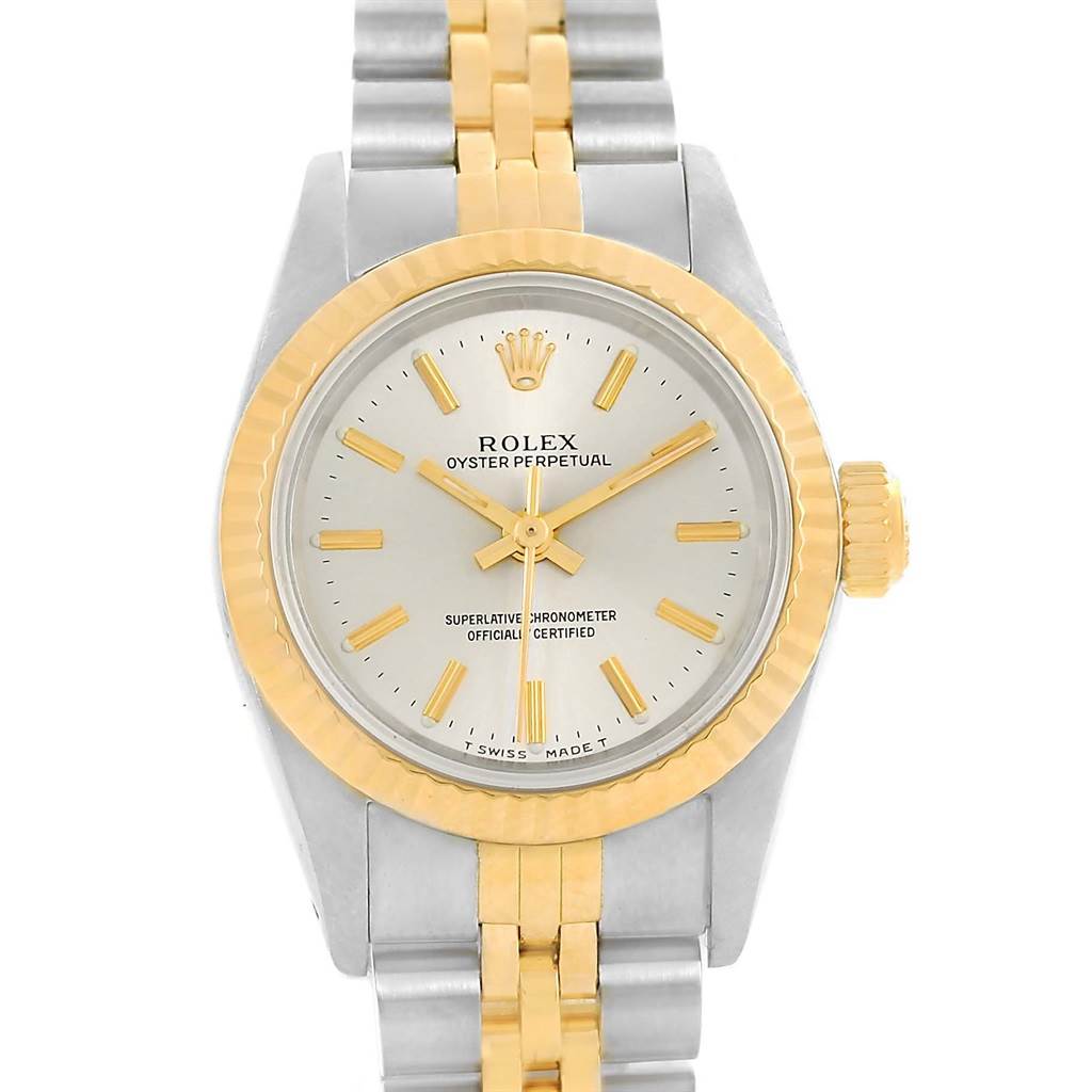 The Rolex Oyster Perpetual 67193 Women
s Steel and Gold (two tone) Silver Dial 67193 Women
s Steel and Gold (two tone) Silver Dial watch is shown from a front angle, highlighting the dial, bezel, and bracelet.