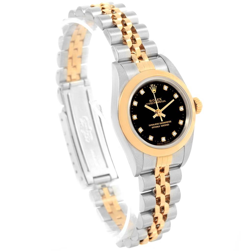 The image shows a Rolex Oyster Perpetual 76183 Women's Steel and Gold (two tone) Black Dial 76183 Women's Steel and Gold (two tone) Black Dial watch at a slight angle, highlighting the face, crown, and two-tone bracelet.