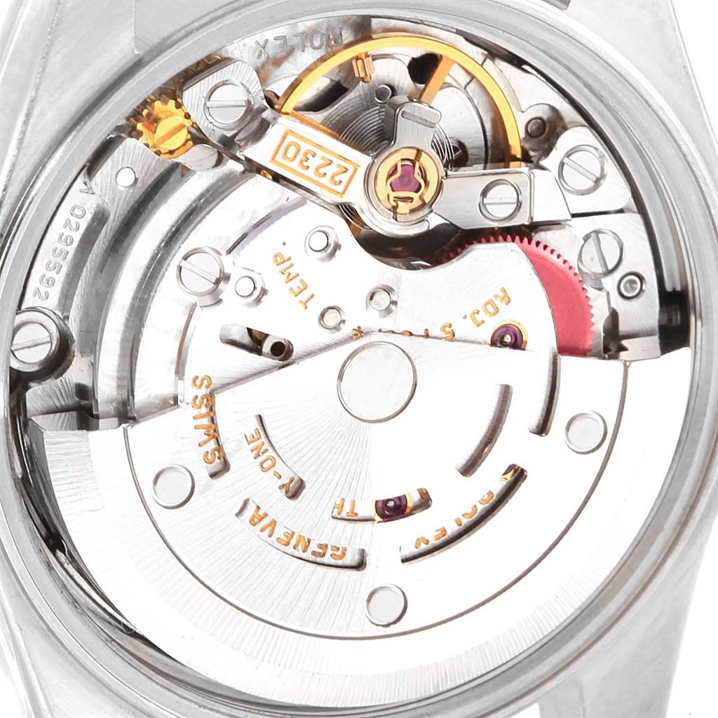 The image shows the inner mechanical movement of a Rolex Oyster Perpetual 76183 Women's Steel and Gold (two tone) Black Dial 76183 Women's Steel and Gold (two tone) Black Dial watch, viewed from the back.