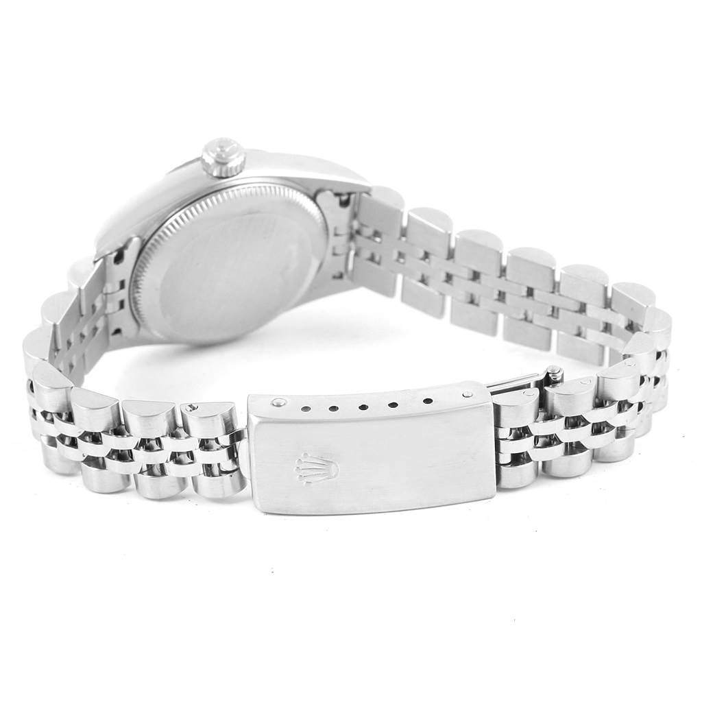 The image shows the back case and bracelet clasp of a Rolex Oyster Perpetual 76094 Women's Stainless Steel Black Dial 76094 Women's Stainless Steel Black Dial watch, viewed from a rear angle.