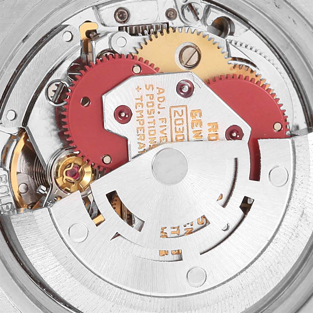 The image shows the internal mechanism and movement parts of a Rolex Oyster Perpetual 6917 Women's Stainless Steel Champagne Dial 6917 Women's Stainless Steel Champagne Dial watch.