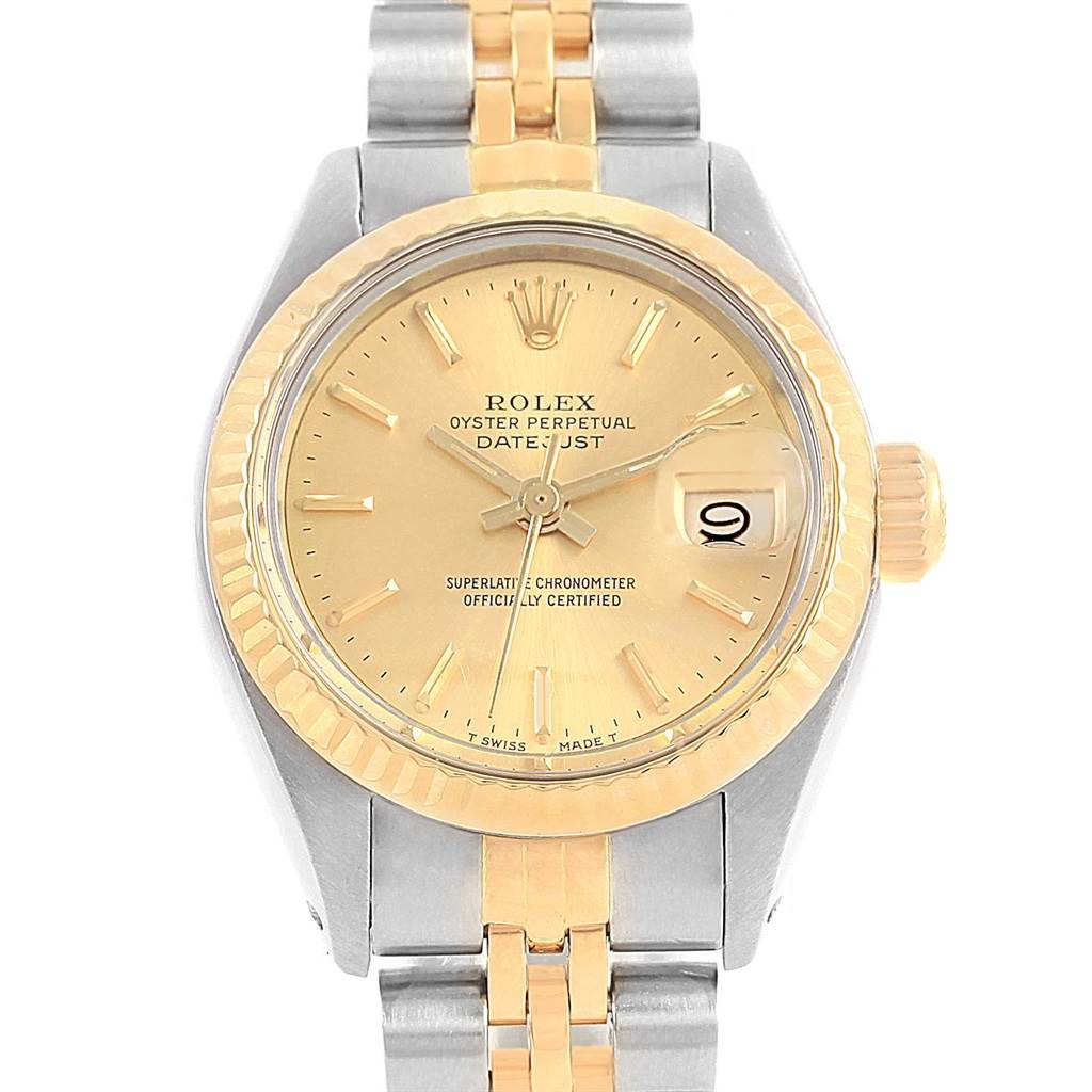 The image shows a front view of a Rolex Oyster Perpetual 6917 Women's Stainless Steel Champagne Dial 6917 Women's Stainless Steel Champagne Dial Datejust watch, highlighting its gold dial, fluted bezel, and two-tone bracelet.