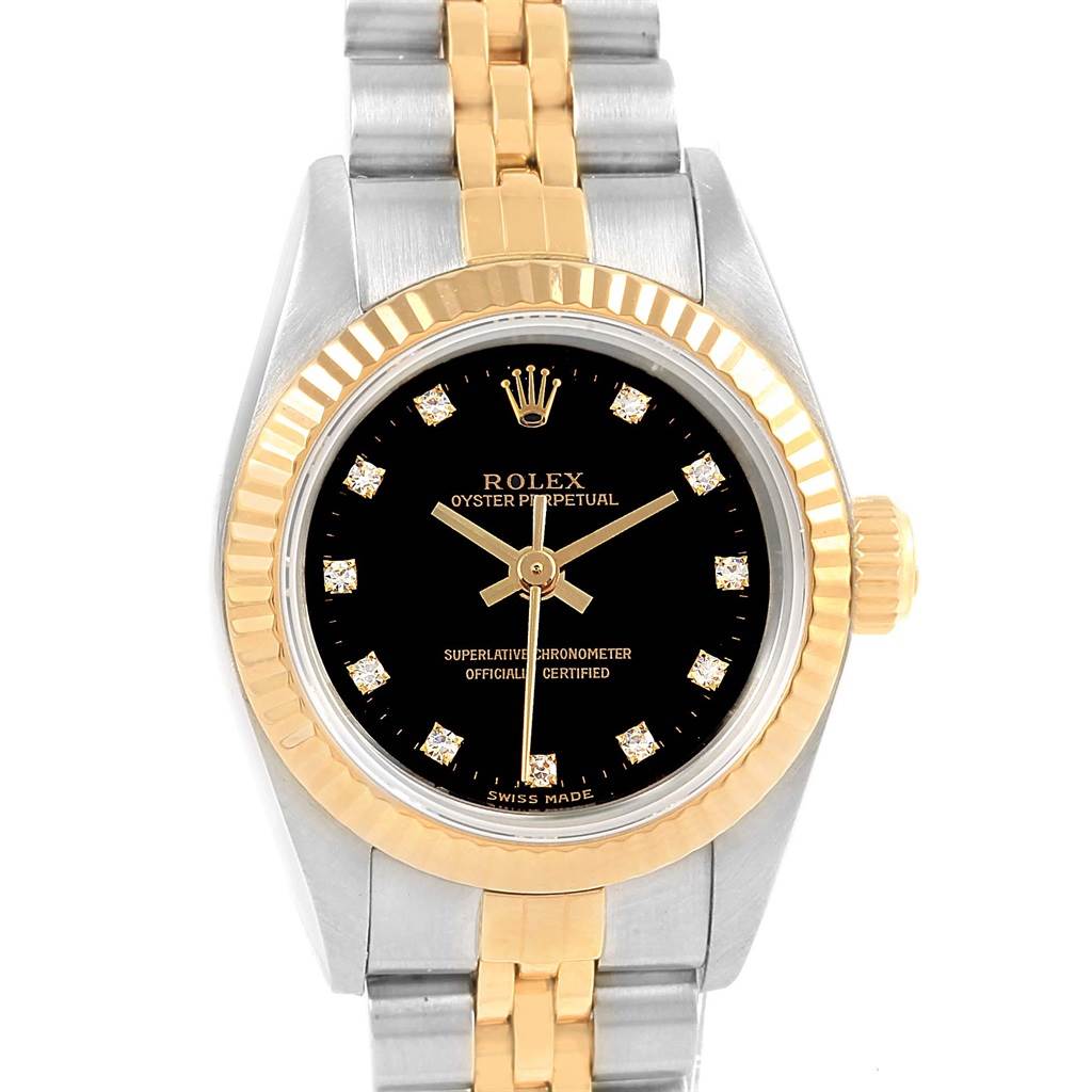 This is a front-facing view of a Rolex Oyster Perpetual 67193 Women's Steel and Gold (two tone) Black Dial 67193 Women's Steel and Gold (two tone) Black Dial watch showing the dial, bezel, crown, and bracelet.