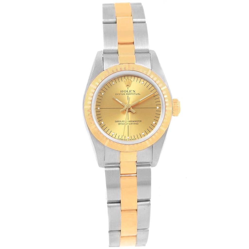 This image shows a Rolex Oyster Perpetual 76243 Women's Steel and Gold (two tone) Champagne Dial 76243 Women's Steel and Gold (two tone) Champagne Dial watch from a front view, featuring a gold and stainless steel bracelet and dial.