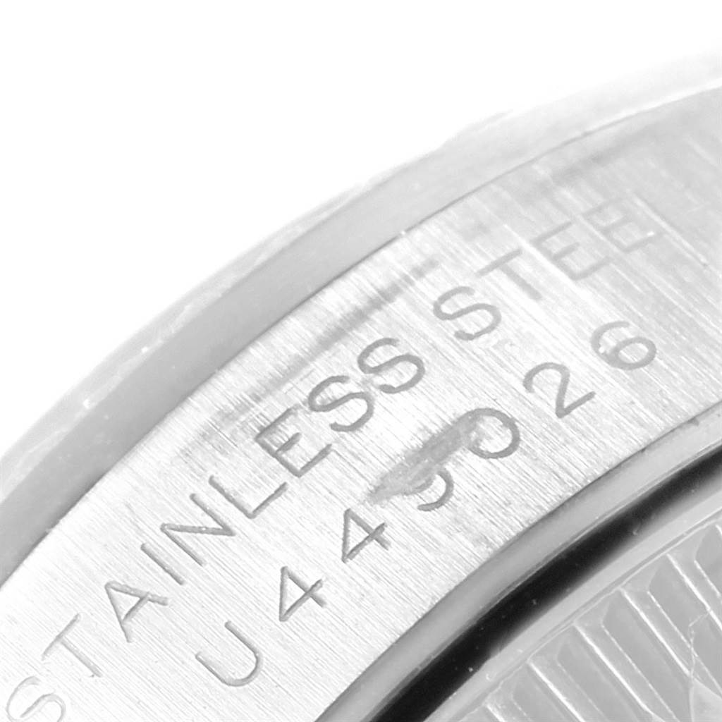 This close-up image shows the case back and engraving of a Rolex Oyster Perpetual 67194 Women's Stainless Steel Pink Dial 67194 Women's Stainless Steel Pink Dial watch.