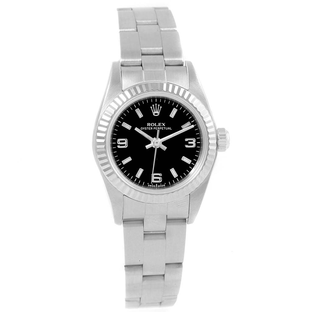 The image shows a front view of a Rolex Oyster Perpetual 76094 Women's Stainless Steel Black Dial 76094 Women's Stainless Steel Black Dial watch, displaying its black dial, stainless steel case, and bracelet.