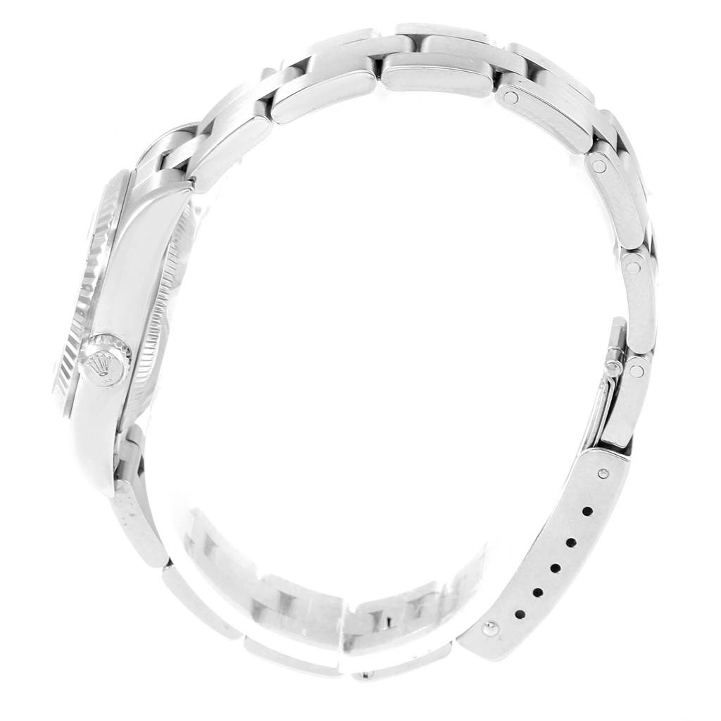 This side view image shows the bracelet and clasp of the Rolex Oyster Perpetual 76094 Women's Stainless Steel Black Dial 76094 Women's Stainless Steel Black Dial watch, highlighting the crown and links.