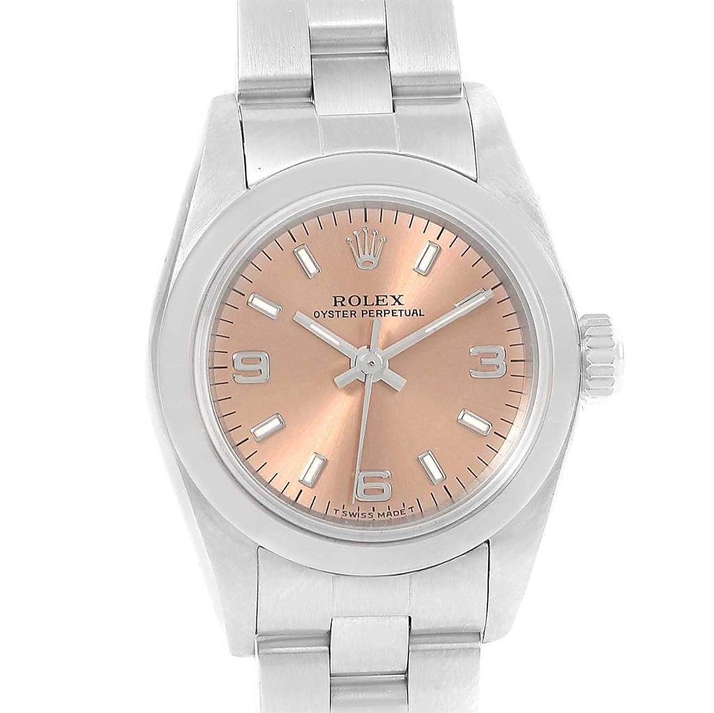 This is a frontal view of a Rolex Oyster Perpetual 67180 Women
s Stainless Steel Pink Dial 67180 Women
s Stainless Steel Pink Dial watch, displaying its rose gold dial, hands, hour markers, and part of the bracelet.