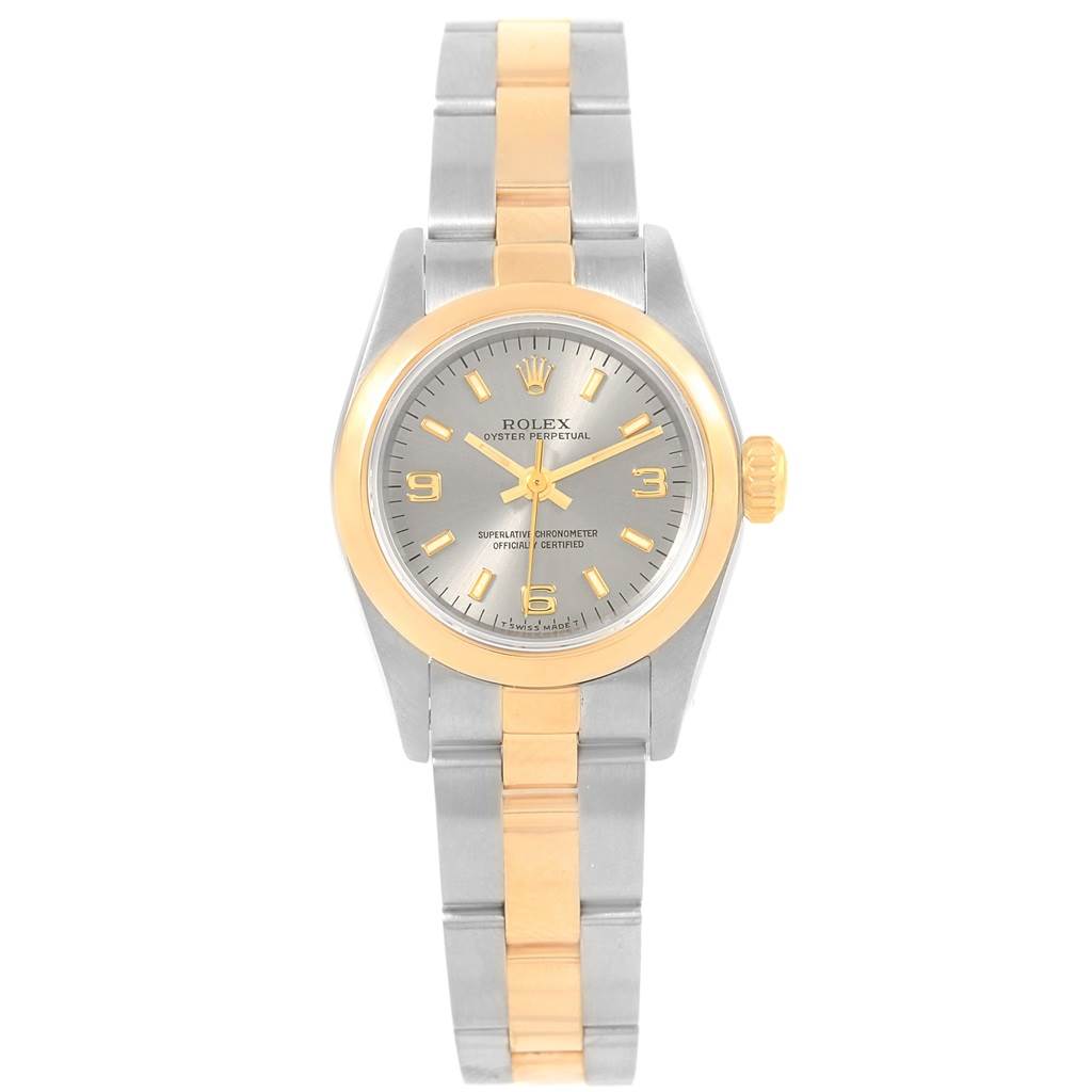 The Rolex Oyster Perpetual 67183 Women's Steel and Gold (two tone) Grey Dial 67183 Women's Steel and Gold (two tone) Grey Dial watch is shown from a front angle, displaying the dial, bezel, case, and bracelet.