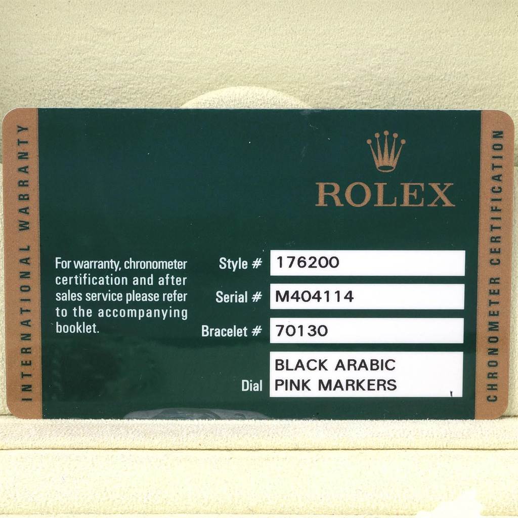 The image shows an international warranty card for the Rolex Oyster Perpetual 176200 Women's Stainless Steel Black Dial 176200 Women's Stainless Steel Black Dial model, detailing style, serial, and bracelet numbers, and dial description.