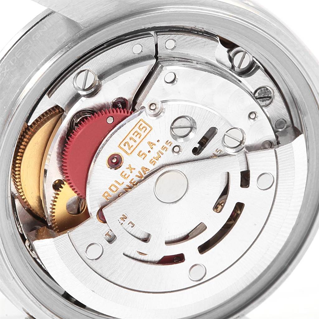 The image shows the inner mechanical movement of a Rolex Oyster Perpetual 79160 Women's Stainless Steel Blue Dial 79160 Women's Stainless Steel Blue Dial watch from a close-up angle.