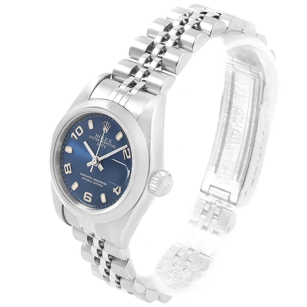 The image shows a Rolex Oyster Perpetual 79160 Women's Stainless Steel Blue Dial 79160 Women's Stainless Steel Blue Dial watch from a front angled view, highlighting the dial, bezel, and part of the bracelet.